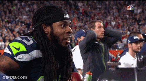 Man With Dreadlocks In Jersey Number 52 GIF