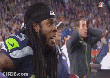 Man With Dreadlocks In Nike Headband Watching Football GIF
