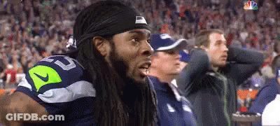 Man With Dreadlocks In Nike Headband Watching Game GIF