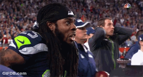 Man With Dreadlocks In Nike Headband Watching Sports Game GIF