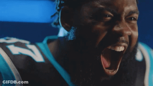Man With Dreadlocks In Panthers Jersey And Gloves GIF