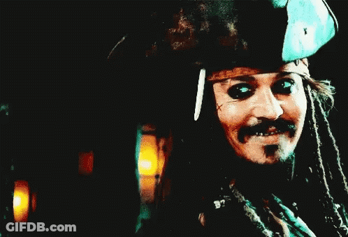 Man With Dreadlocks In Pirate Hat Holding Sword GIF