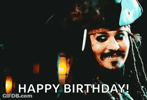Man With Dreadlocks In Pirate Hat Waving GIF