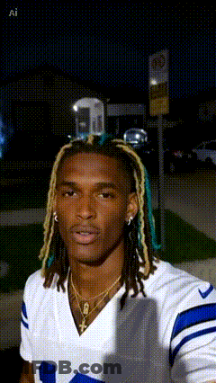 Man With Dreadlocks In White And Blue Jersey Number 14 GIF
