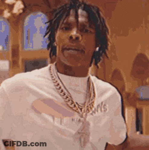 Man With Dreadlocks In White Shirt And Gold Chain GIF