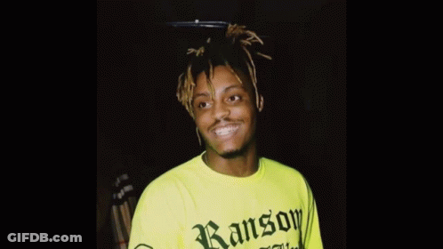 Man With Dreadlocks In White Shirt Saying Archiv GIF