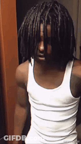 Man With Dreadlocks In White Tank Top GIF