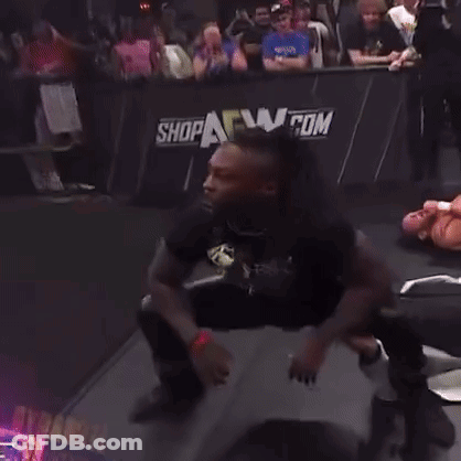 Man With Dreadlocks In Wrestling Ring GIF