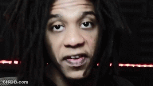 Man With Dreadlocks Making Funny Face GIF