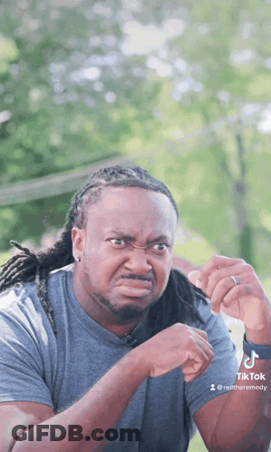 Man With Dreadlocks Making Funny Face GIF