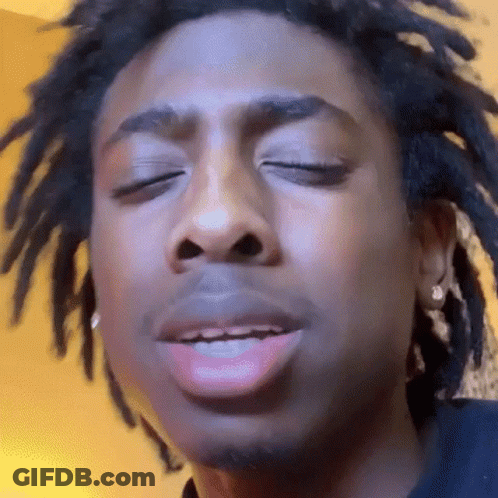 Man With Dreadlocks Making Funny Face Eyes Closed GIF