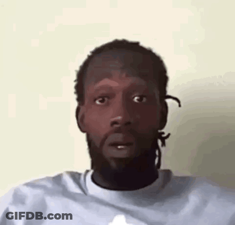 Man With Dreadlocks Making Funny Face GIF