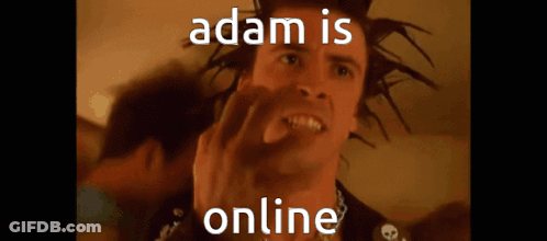 Man With Dreadlocks Making Funny Face With Adam Is Online Text GIF