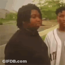 Man With Dreadlocks Next To Man In White Jersey GIF