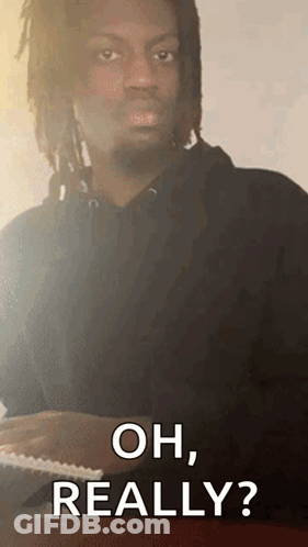Man With Dreadlocks Saying Oh Really GIF