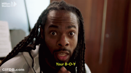 Man With Dreadlocks Saying Your B-O-Y In Front Of Million Stories Logo GIF