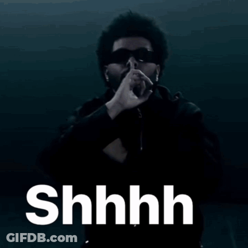 Man With Dreadlocks Shushing GIF