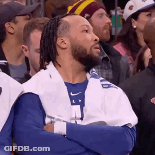 Man With Dreadlocks Sitting Crossed Arms GIF