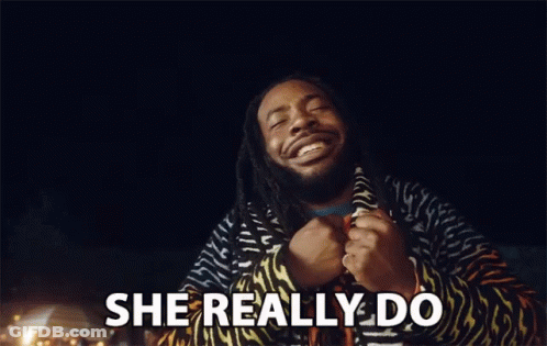 Man With Dreadlocks Smiling And Saying She Really Do GIF