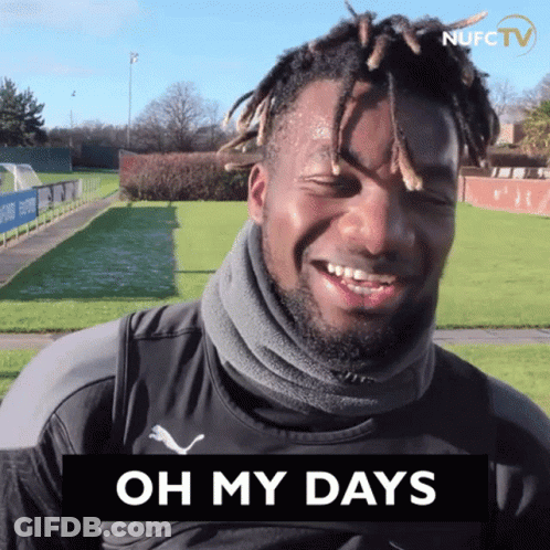 Man With Dreadlocks Smiling At Oh My Days Sign GIF