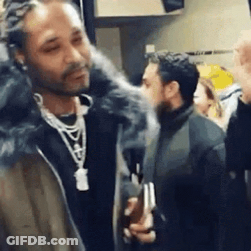 Man With Dreadlocks Smoking Cigarette GIF