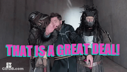 Man With Dreadlocks Standing Beside Two Costumed Men Saying That Is A Great Deal GIF