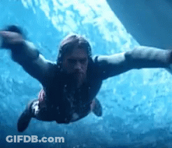 Man With Dreadlocks Swimming GIF