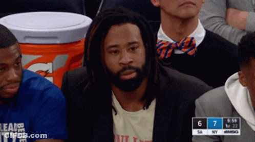 Man With Dreadlocks Watching Game In Stands GIF