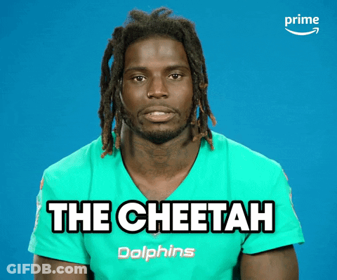 Man With Dreadlocks Wearing Cheetah Shirt GIF