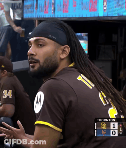 Man With Dreadlocks Wearing Headband Saying Junk GIF