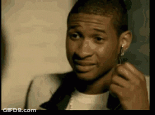 Man With Ear Buds Funny Face GIF