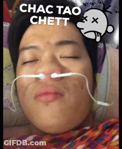 Man With Ear Buds In Nose And Chac Tao Chett Face GIF