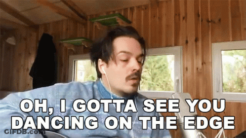 Man With Earbuds Saying Oh I Gotta See You Dancing On The Edge GIF