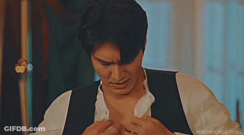Man With Earpiece Close Up GIF