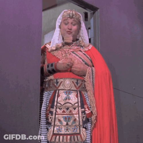 Man With Egyptian Belt Smiling GIF