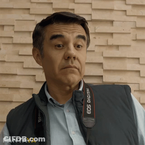 Man With EOS Camera Strap GIF