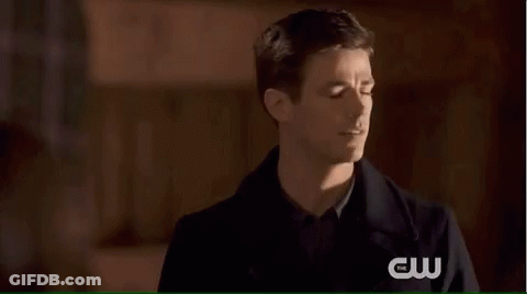 Man With Eyes Closed And CW Logo GIF