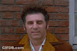 Man With Eyes Closed And Fan Blowing GIF