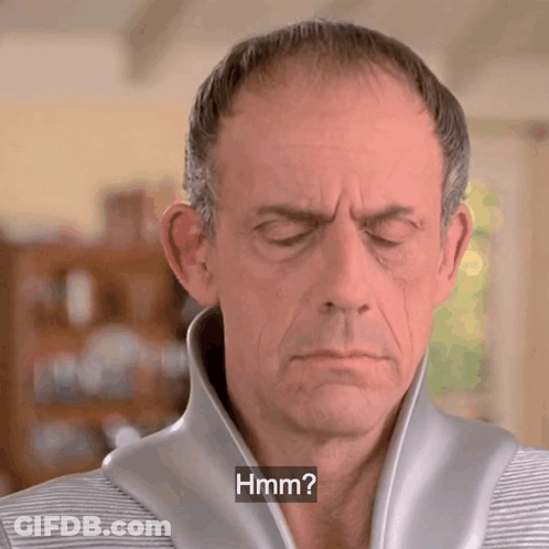 Man With Eyes Closed And Hmm GIF