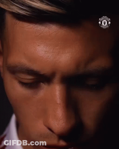 Man With Eyes Closed And Man United Logo GIF