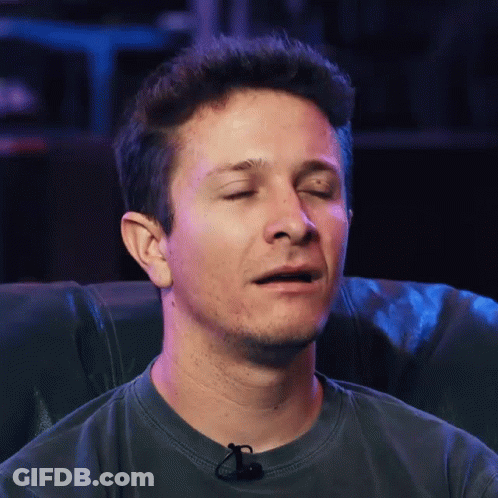 Man With Eyes Closed And Microphone GIF
