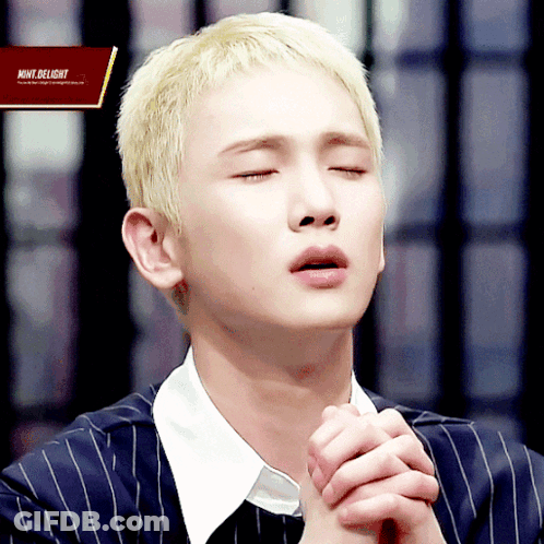 Man With Eyes Closed And Move Delight Sign GIF