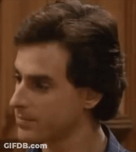 Man With Eyes Closed And Ponytail GIF