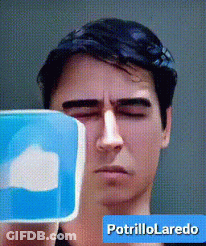 Man With Eyes Closed Holding Blue Item GIF