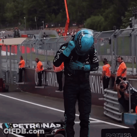 Man With Eyes Closed In AMG Petronas Shirt GIF