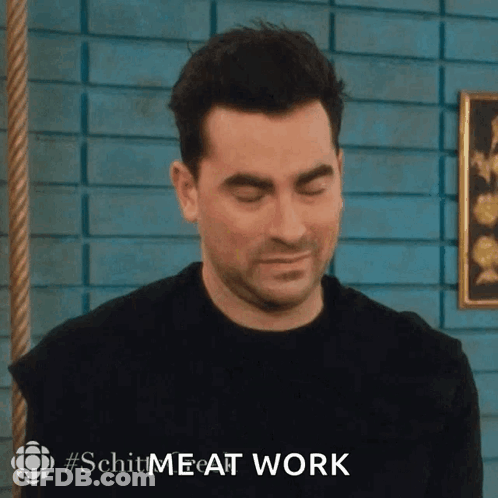 Man With Eyes Closed In Front Of Blue Brick Wall Saying Schit Me At Work GIF