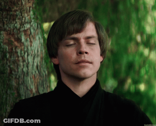 Man With Eyes Closed In Front Of Tree GIF