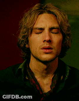 Man With Eyes Closed Pointing GIF