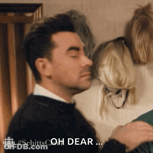 Man With Eyes Closed Saying Oh Dear To Woman GIF