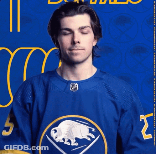 Man With Eyes Closed Wearing Blue Jersey Number 2 GIF